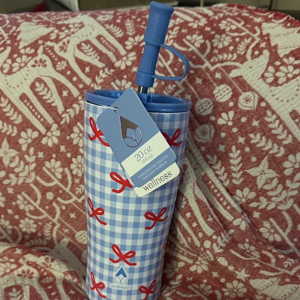 Wellness stainless steel tumbler with red bows on gingham blue pattern